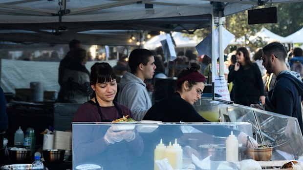 People looking at stalls at the Bondi Farmers Market, Bondi Beach, Sydney, Saturday, June 6, 2020. 