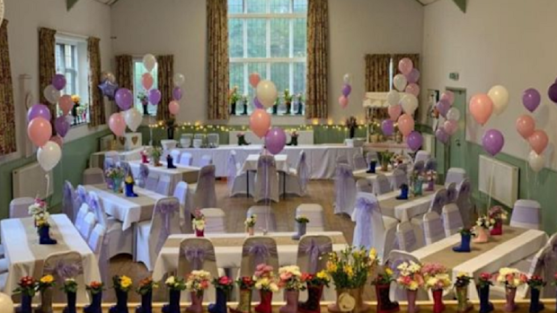 The reception went ahead as scheduled at Emily's request.