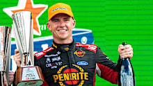 Lee Holdsworth and David Reynolds on the Melbourne 400 podium.