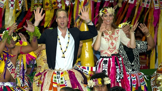The Duke and Duchess of Cambridge dance with locals at Vaiaku Falekaupule during a visit to Tuvalu, Solomon Islands.