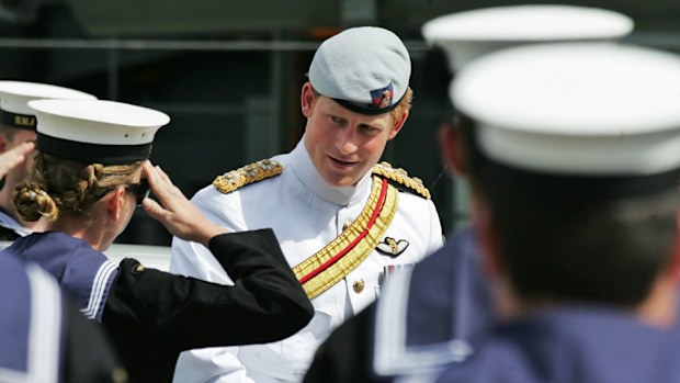 Prince Harry is saluted as he arrives at the Garden Island Naval Base. (AAP/Mick Tsikas)