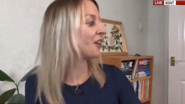 The Sky news reporter apologised after her son came into the room asking for biscuits.