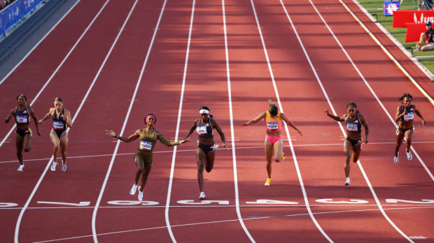 Sha'Carri Richardson crosses the finish line.