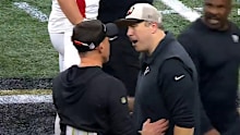 Arthur Smith confronts Dennis Allen following the Falcons loss to Saints.