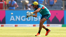 Mitchell Starc warms up for Australia after being rested. 