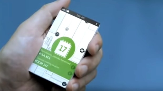 A man holds a credit card sized phone in the Microsoft promo film. He later breaks the phone into individual, credit card sized pieces.