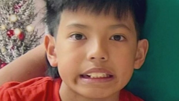 A boy who was hit by a train on the way to school in Adelaide is fighting for life with his family by his side.Rhyle Abiado, 11, was struck by a train at Tambelin Railway Station in Evanston Gardens in the city's north yesterday morning.