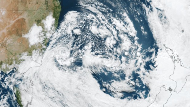 The weather system that brought cyclone-like winds and rain can be seen from space as it moves away from Australia. As the system moves away from the east coast, it's developing a colossal low-pressure complex covering most of the Tasman Sea. 