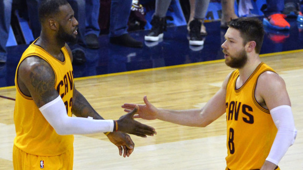 LeBron James (L) and Matthew Dellavedova. (AAP-file)
