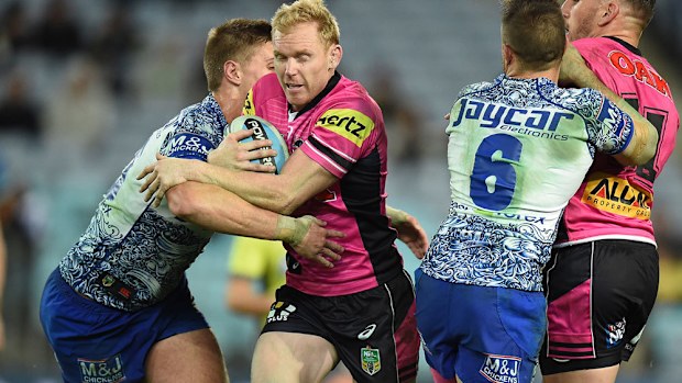 Peter Wallace runs the ball for Penrith.(AAP-file)