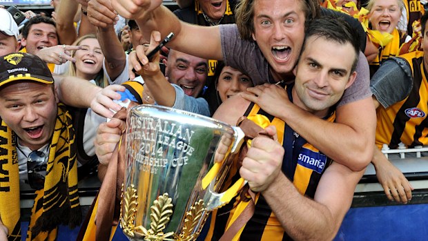 Brian Lake celebrates the Hawks' 2014 Premiership. (AAP-file)