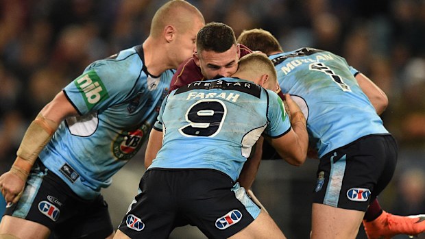 Blues players hit Darius Boyd (AAP)