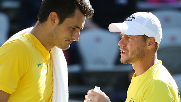 Bernard Tomic and Lleyton Hewitt. (AAP)