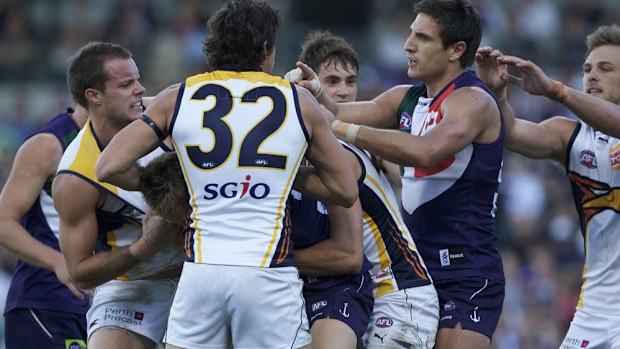 Eagles and Dockers players brawl in 2010. (AAP-file)