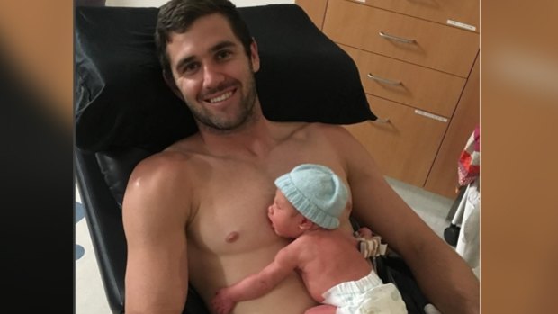 Eagles forward Jack Darling with his new born son Max.