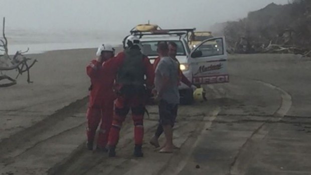 Rescue crews at the site of the Kaipara Harbour capsizing.
