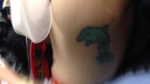 Police released this photo of a tattoo they hope will help identify the woman.
