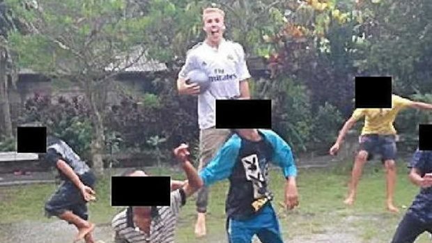 Oliver Bridgeman's Facebook page shows him playing football with children in Bali.