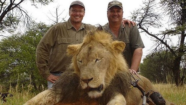 Hunter Walter James Palmer, left, with another lion he killed.