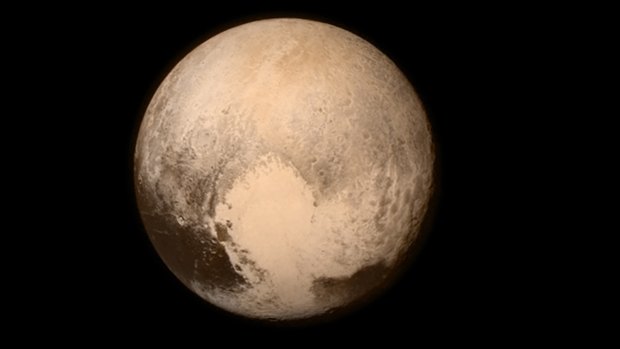 The first close-up picture of Pluto taken by New Horizons, showing the heart-shaped region named the Tombaugh Regio.