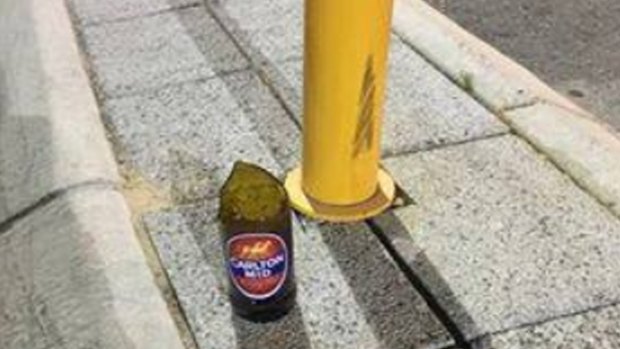 A Success man will face court after allegedly throwing a beer bottle at a Muslim.
