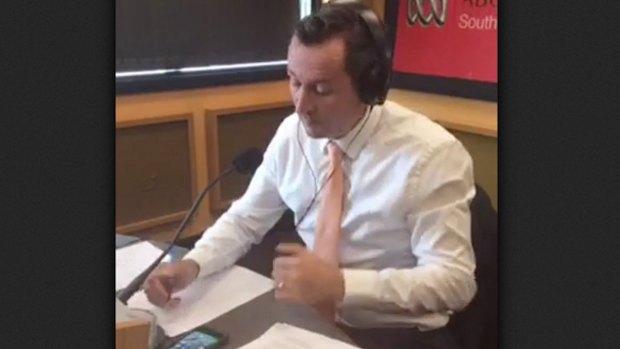 Mark McGowan answering questions live in the studio.