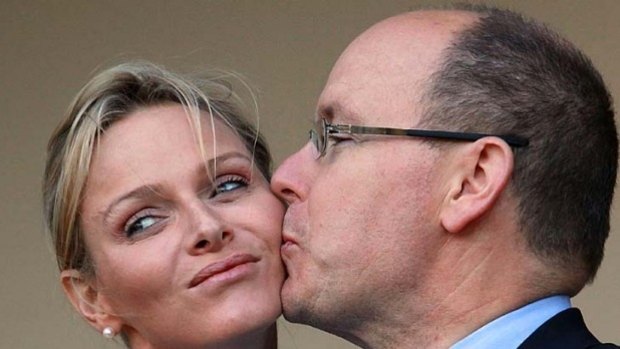 Awkward: Prince Albert of Monaco kisses Princess Charlene in South Africa.