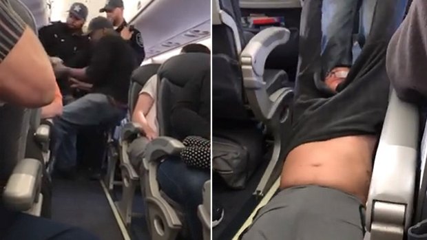 The man was dragged down the aisle of the plane.