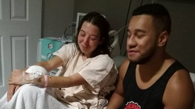 Leonie Hafke in a Bali hospital with Temson Junior Simeki's brother Cruz at her bedside.