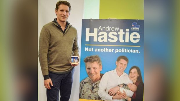 Canning MP Andrew Hastie was sacked from the Army Reserve after he refused to remove photos of himself in uniform from election campaign material.