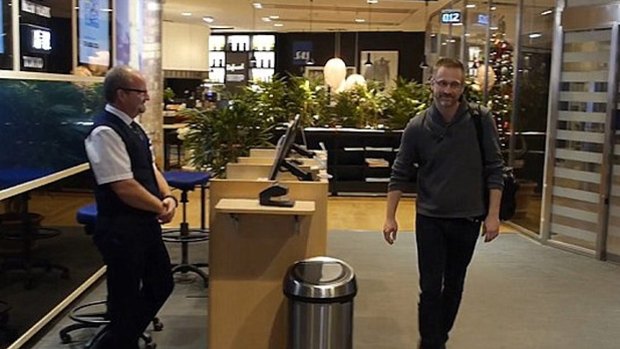 Andreas Sjöström strolls through Stockholm airport.