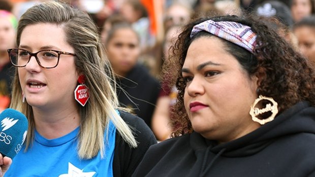 AYCCC national director Gemma Borgo-Caratti in her Haus of Dizzy earrings, with activist Larissa Baldwin.