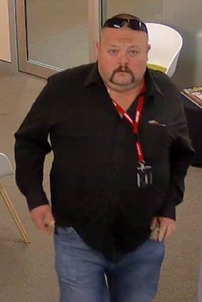 Police want to speak to this man about a string of Brisbane CBD office burglaries stretching back at least 15 months