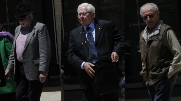 The three men accused of protesting outside Canberra's abortion clinic leave the ACT Magistrates Court on Monday. From left, Kerry Mellor, John Popplewell and Ken Clancy.