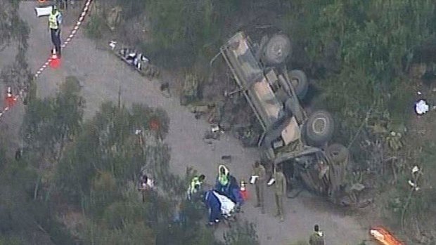 The open-top army truck was carrying 18 soldiers when it flipped at the Holsworthy Barracks.