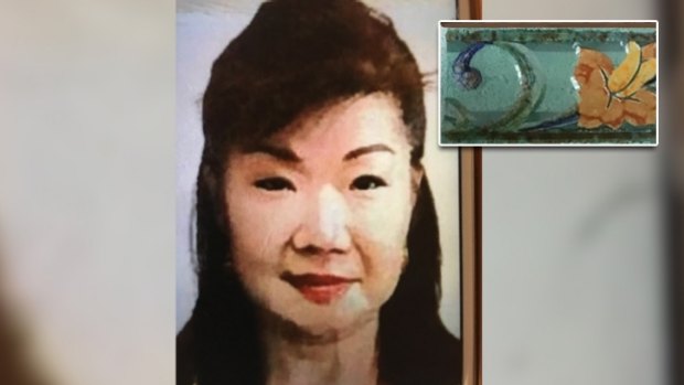 Annabelle Chen and one of the tiles found inside the suitcase dropped at the Fremantle Traffic Bridge.