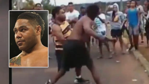 Chris Sandow, left, has been charged over a public brawl in a street.