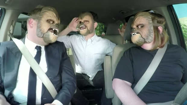 James Corden, JJ Abrams and Candace Payne don Chewbacca masks.