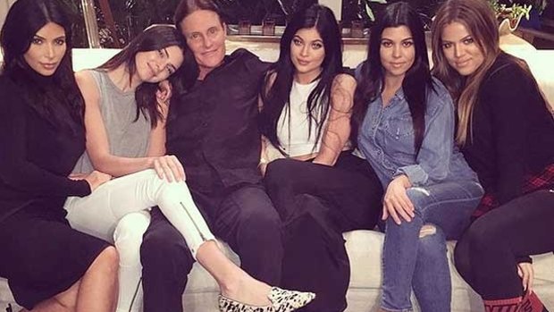 Family man: Bruce Jenner, flanked by his daughters, Kendall, centre left, and Kylie, centre right, as well as his step-daughters, from left to right, Kim, Kourtney and Khloe. 