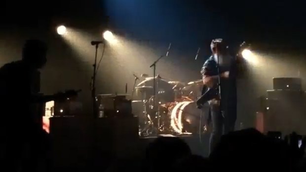 The drummer from the Eagles of Death Metal can be seen ducking behind his drum kit as shots were fired in the Bataclan. 