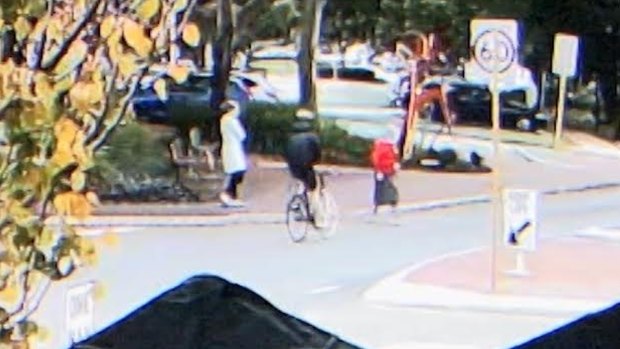 The cyclist can be seen heading for a collision with the woman on CCTV footage.