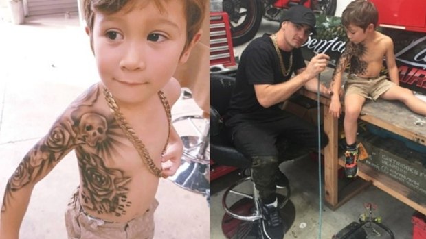 Benjamin Lloyd airbrushes a tattoo on a young boy.