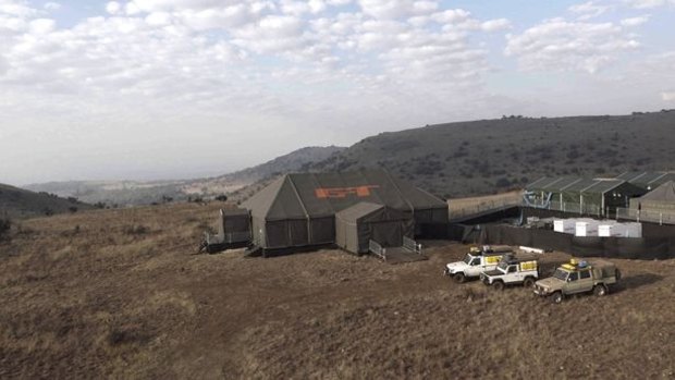 The tent is a far cry from the empty plane hangar the men filmed <i>Top Gear</i> in.