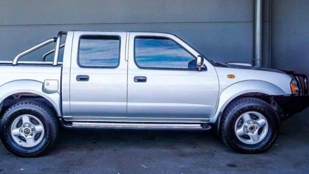 A ute similar to the stolen silver Nissan Navara, used as a getaway vehicle in five armed robberies.