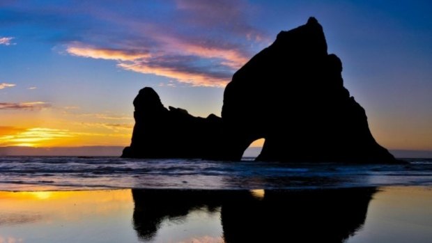 The Archway Islands off Wharariki Beach, where two people became stranded on Wednesday evening.
