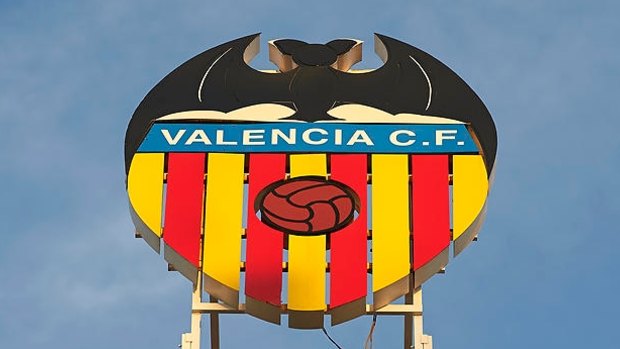 Bat signal: Valencia's logo overlooks the city.
