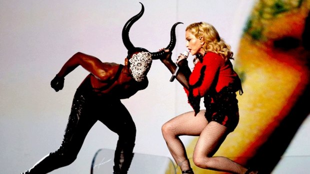 Madonna performs <i>Living for Love</i> at this year's Grammy Awards.