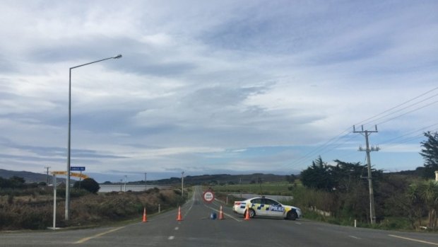 Police cordon off the highway where Tamara Schmidt was struck by a car. 