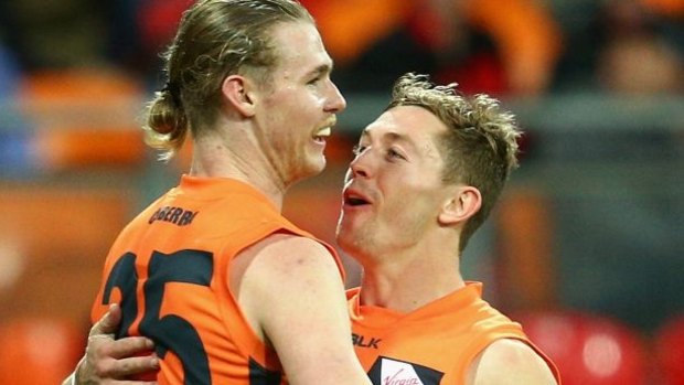Cam McCarthy (left) is part of a trade deal that could land GWS a top three pick