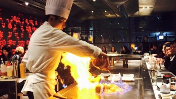 Teppanyaki restaurants allow diners to sit around an open hot plate, as a chef prepares and cooks meals in front of them.